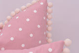 Pom pom trim cushion