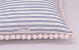 Pompom cushion with feather insert