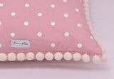 Pink pom pom cushion